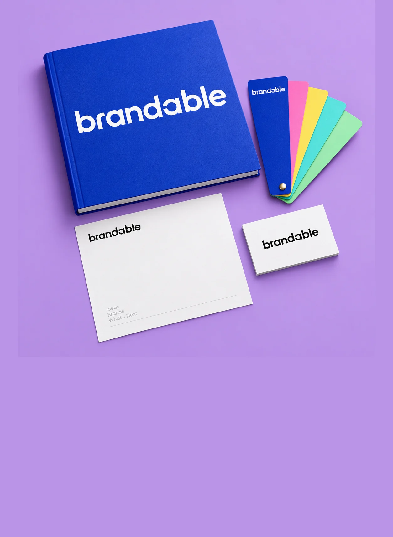 Cobalt brand book and stationery with color swatches on lavender